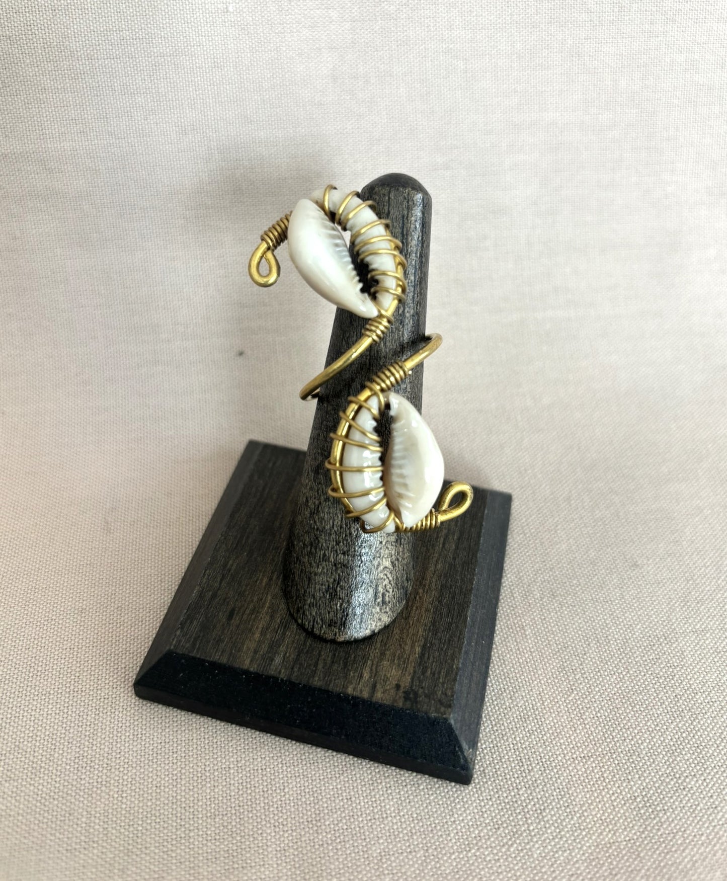 Double Cowrie Wrapped with Brass Ring